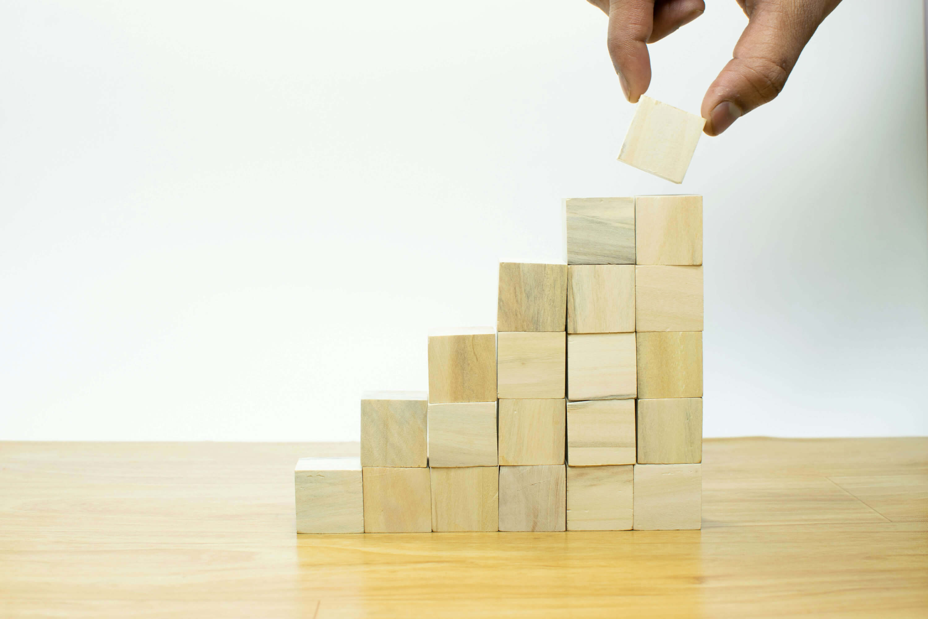 People moving post-it notes on a kanban board